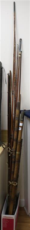 Five vintage fishing rods including bamboo and cane examples                                                                           