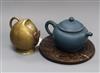 A blue Yixing teapot with seal mark, a soapstone bi and a 19th century Chinese bronze water dropper in the form of a Cadogan teapot    