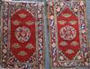 A near pair of Tibetan red ground rugs, 4ft 7in. x 2ft 3in. and 4ft 5in. x 2ft 10in.                                                   