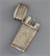 A late 19th/early 20th century continental embossed silver etui case, 92mm.                                                            