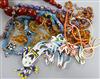 A group of assorted necklaces including simulated amber, coral, American Indian? bead and amber.                                       