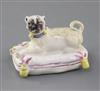 An extremely rare Derby or Girl-on-a-Horse factory figure of a pug, c.1755, l. 6.5cm, some restoration                                 