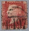 A Penny Red stamp with an error to the top right corner                                                                                