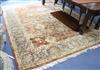 A Persian style tan ground carpet 306cm x 250cm                                                                                        