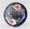 A Moorcroft 'anemone' cobalt blue ground bowl, c.1950, diameter 22.3cm                                                                 