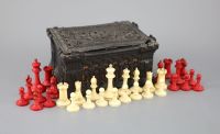 A Jaques London red and white ivory 2¾" Staunton chess set, c.1850, 8.25 x 6 x 4in.                                                    