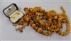 Five amber bead/fragment necklaces and three pairs of amber earrings, one other pair and a single earring.                             