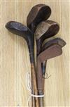 Five vintage golf clubs                                                                                                                