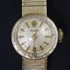 A lady's 14k gold Rolex manual wind wrist watch,                                                                                       