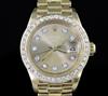 A lady's 1980's? 18ct gold and diamond set Rolex Oyster Perpetual Date wristwatch, on 18ct Rolex bracelet with deployment clasp,       