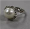 An 18ct white gold, diamond and cultured pearl dress ring, size M.                                                                     