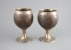 A pair of George III silver mounted coconut cups by Phipps & Robinson                                                                                                                                                       