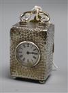 An Edwardian silver cased travelling timepiece by William Comyns, London, 1901, 11cm over handle.                                      