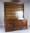 A mid 18th century oak inverse breakfront dresser, W.6ft 2in. D.1ft11in. H.7ft 2in.                                                    