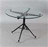 A Norman Foster for Tecno 'Nomos' circular glass top table, Diam. 2ft 11.5in. H.2ft 3in.                                               