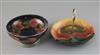 A Moorcroft 'pomegranate' and Tudric pewter mounted bowl and an 'Eventide' cake dish, c.1920-5, diameter 19cm and 22cm, both cracked   