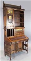 A Gillows Aesthetic Movement walnut, parcel gilt and thuya wood secretaire cabinet, c 1880's                                           