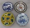 A Delft plate, an armorial plate and two others                                                                                        