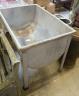 A rectangular galvanised metal water trough, length 97cm, depth 66cm, height 77cm                                                                                                                                           