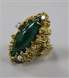 An early 1970's 18ct gold, diamond and malachite dress ring, size L.                                                                   