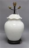 A Chinese white glazed porcelain jar and cover, late 19th/early 20th century, mounted as a lamp H.57.5cm                               