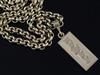 A heavy 9ct gold circular link chain with 1970's 9ct gold ingot pendant, gross weight 119.5 grams.                                     