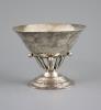 An early 20th century Georg Jensen planished sterling silver circular pedestal bowl                                                                                                                                         