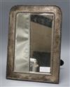 An Edwardian silver mounted strut mirror, J. Batson & Son, London, 1905, 37.5cm.                                                       