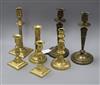 A pair of Empire style candlesticks, another pair and a single                                                                         