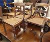 A set of four simulated rosewood beech cane seat dining chairs                                                                         