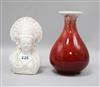 A Chinese blanc de chine bust and a sang-de-boeuf glazed vase 20cm                                                                     