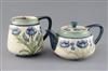 A Moorcroft Macintyre 'blue poppy' teapot and matching milk jug, Rd. no. for 1905, teapot 20cm across                                  