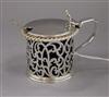 A Victorian pierced silver drum shaped mustard pot, London 1887, height 65mm.                                                          