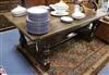 A 17th century style oak refectory table 208 x 101cm                                                                                   