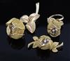 A suite of three items of 18ct gold and diamond set jewellery by Piaget,                                                               