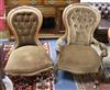 A pair of Victorian ladies and gents button back walnut armchairs                                                                      