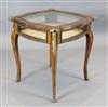 An early 20th century French ormolu mounted kingwood bijouterie table, W.2ft D.2ft H.2ft 3in.                                          