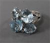 A silver, blue topaz and colourless stone set dress ring, size L.                                                                      