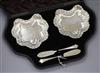 A pair of Victorian silver butter dishes and Onslow handled butter knives, cased, London 1891.                                         