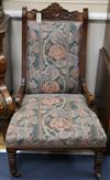 A pair of late Victorian walnut grandfather / nursing chairs                                                                           