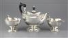 A George V silver three piece pedestal tea set, Alexander Clark & Co Ltd, gross 39 oz.                                                 