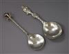 An Arts and Crafts silver caddy spoon with cabochon terminal and a Dutch imported silver spoon.                                        