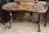 A Victorian figured walnut kidney shaped side table W.120cm                                                                            