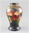 A Moorcroft 'orchid' flambe small baluster vase, 1930/40's, H.15.2cm                                                                   
