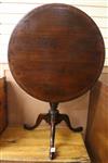 A George III mahogany circular tilt top tea table W.76cm                                                                               