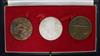 A 1948 Olympics bronze medallion and two 1972 commemorative FA Cup medallions, one in silver, the other bronze                         