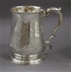 A George II engraved silver baluster mug, London 1752, 10 oz.                                                                          