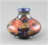 A Moorcroft 'pomegranate' squat baluster vase, c.1918-26, H.10.3cm                                                                     