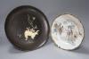 A Japanese Arita dish together with a similar ivory and mother of pearl mounted lacquer dish, diameter 30cm                                                                                                                 