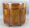 An Edwardian Edwards & Roberts marquetry inlaid satinwood demi-lune side cabinet, W.3ft 10in. D.1ft 8in. H.3ft 4in.                    